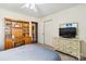 Bedroom with a built-in bookcase, a television, and a closet at 1976 Mcilwain Rd, Lancaster, SC 29720