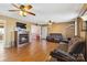 Spacious living room featuring a fireplace, hardwood floors, ceiling fans, and ample seating at 1976 Mcilwain Rd, Lancaster, SC 29720