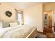 Charming bedroom with a queen-size bed and access to a hallway at 2349 Shiny Leaf Dr, Denver, NC 28037