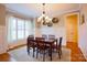 Formal dining room with hardwood floors and chandelier at 2349 Shiny Leaf Dr, Denver, NC 28037