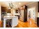 Modern kitchen with stainless steel appliances and granite countertops at 2349 Shiny Leaf Dr, Denver, NC 28037