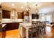 Modern kitchen with granite island and stainless steel appliances at 2349 Shiny Leaf Dr, Denver, NC 28037