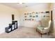 Playroom with built-in shelving and comfortable armchair at 2349 Shiny Leaf Dr, Denver, NC 28037