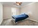 Charming bedroom with a metal bed frame and ceiling fan at 27 Quayside Ct, Clover, SC 29710