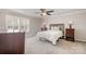 Bright bedroom with double bed, ceiling fan, and ample closet space at 27 Quayside Ct, Clover, SC 29710