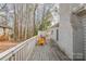 Wooden deck with white railing and two Adirondack chairs at 27 Quayside Ct, Clover, SC 29710