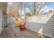 Relaxing deck with wooden chairs, overlooking wooded area at 27 Quayside Ct, Clover, SC 29710