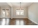 Dining room with hardwood floors and French doors leading to the outside at 27 Quayside Ct, Clover, SC 29710