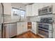 Modern kitchen with stainless steel appliances and corner shelving at 27 Quayside Ct, Clover, SC 29710