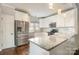 Modern kitchen with stainless steel appliances and granite countertops at 27 Quayside Ct, Clover, SC 29710