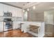 White kitchen with granite countertops and convenient pull-out drawers at 27 Quayside Ct, Clover, SC 29710