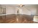 Large living area with hardwood floors and a fireplace at 27 Quayside Ct, Clover, SC 29710