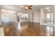 Open concept living room with hardwood floors and kitchen view at 27 Quayside Ct, Clover, SC 29710