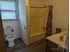 Bathroom with tub shower combo and updated vanity at 3798 Providence Mill Rd, Maiden, NC 28650