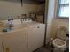 Laundry room with washer, dryer and toilet at 3798 Providence Mill Rd, Maiden, NC 28650