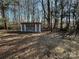 Small shed with two windows and white trim at 3798 Providence Mill Rd, Maiden, NC 28650