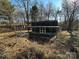 Green gable outbuilding with covered porch and additional shed at 3798 Providence Mill Rd, Maiden, NC 28650