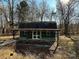 Green gable outbuilding with covered porch at 3798 Providence Mill Rd, Maiden, NC 28650