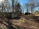 Multiple rustic outbuildings on a wooded lot at 3798 Providence Mill Rd, Maiden, NC 28650