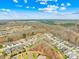 Aerial view of a residential area with houses nestled among trees at 423 Granite Lake Ct, Denver, NC 28037