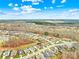 Aerial view of a neighborhood with houses, trees and walking trails at 423 Granite Lake Ct, Denver, NC 28037