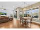 Bright dining area with hardwood floors and view to backyard at 423 Granite Lake Ct, Denver, NC 28037