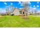 Single-Gathering home exterior showcasing landscaping and front yard at 423 Granite Lake Ct, Denver, NC 28037