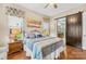 Main bedroom with sliding barn door to en suite bathroom at 423 Granite Lake Ct, Denver, NC 28037