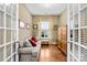 Home office with hardwood floors and built-in shelving at 423 Granite Lake Ct, Denver, NC 28037