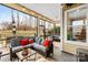 Relaxing screened porch with comfortable seating, a ceiling fan, and views of the backyard at 423 Granite Lake Ct, Denver, NC 28037