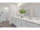 Modern bathroom with dual sinks, white cabinetry, and a shower with glass doors at 444 Berryman Rd, Rock Hill, SC 29732