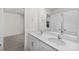 This bathroom features dual sinks, white cabinets, and access to the bedroom at 444 Berryman Rd, Rock Hill, SC 29732