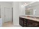 Elegant bathroom featuring double sink vanity with granite countertops and tile flooring at 4551 Selhurst Dr, Indian Land, SC 29707