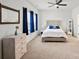 Cozy bedroom with natural light, neutral colors, and decorative wooden furniture at 4551 Selhurst Dr, Indian Land, SC 29707