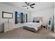 Spacious bedroom with carpeted floor and large window at 4551 Selhurst Dr, Indian Land, SC 29707