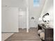 Welcoming foyer with modern console table, decorative lighting, and a view of the staircase at 456 Berryman Rd, Rock Hill, SC 29732