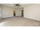 Large bedroom with carpet, ceiling fan and ensuite bathroom at 1021 Kings Mountain Ln, Gastonia, NC 28054