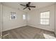 Bedroom with ceiling fan and two windows at 1021 Kings Mountain Ln, Gastonia, NC 28054