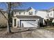 Two-story house with attached garage and landscaping at 1021 Kings Mountain Ln, Gastonia, NC 28054