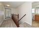 Upper hallway with carpet, leading to bathroom and bedroom at 1021 Kings Mountain Ln, Gastonia, NC 28054