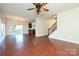 Hardwood floor living room with access to kitchen and stairs at 1021 Kings Mountain Ln, Gastonia, NC 28054