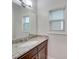 Bathroom with granite vanity and single sink at 15334 S Birkdale Commons Pkwy, Huntersville, NC 28078