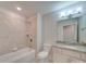 Clean bathroom with granite countertop, updated vanity, and tile shower at 15334 S Birkdale Commons Pkwy, Huntersville, NC 28078