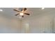 Spacious bedroom with ceiling fan and neutral wall colors at 15334 S Birkdale Commons Pkwy, Huntersville, NC 28078