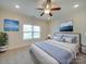 Spacious bedroom with ceiling fan and large window at 15334 S Birkdale Commons Pkwy, Huntersville, NC 28078