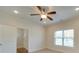 Bedroom with ceiling fan and window with blinds at 15334 S Birkdale Commons Pkwy, Huntersville, NC 28078