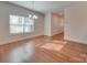 Simple dining room with hardwood floors and a chandelier at 15334 S Birkdale Commons Pkwy, Huntersville, NC 28078