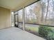 Relaxing screened porch with access to a wooded path at 15334 S Birkdale Commons Pkwy, Huntersville, NC 28078