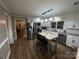 Modern kitchen with stainless steel appliances and island at 506 S Love Chapel Rd, Stanfield, NC 28163