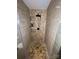 Updated shower with tile surround and built-in shelves at 506 S Love Chapel Rd, Stanfield, NC 28163